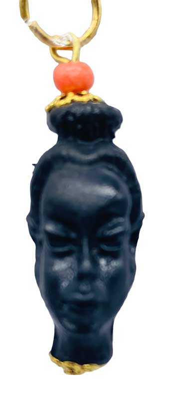 African Head Woman amulet (plastic) African Head Woman amulet (plastic)